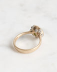 green gemstone ring with barnacles