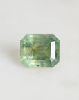 green emerald cut sapphire