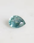 Blue/green Montana sapphire pear shaped with rainbow inclusion