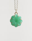 Green carved stone on necklace pendant