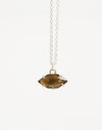Necklace with a pendant on a white background