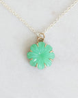 Green carved stone on necklace pendant