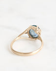 Gold branch ring with blue gemstone