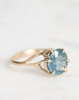 Gold branch ring with blue gemstone