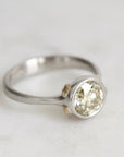 Platinum Ring with Gold Barnacles and a yellow diamond on a white background