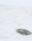Necklace with a pendant on a white background