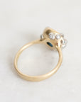 Gold ring with platinum barnacle accents set with diamonds. Photographed from the back.