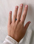blue stone on hand