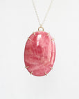 Large pink stone pendant in gold prongs