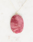 Large pink stone pendant in gold prongs