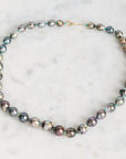 Pearl necklace on a marble surface