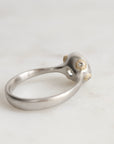 Platinum Ring with Gold Barnacles on a white background