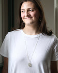 woman wearing necklace