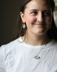 Woman wearing necklace