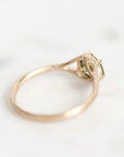 Gold ring from the back. Branching prongs