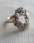 wreath of silver flowers with gold band- 1/4 view