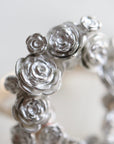 wreath of silver flowers with gold band- closeup