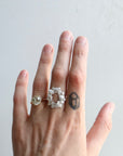 wreath of silver flowers with gold band- on person