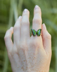Green Tourmaline Psyche Butterfly Cameo face ring on person by hannah blount jewelry