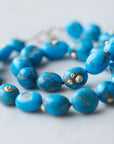 kingman Turquoise beaded necklace with red silk by hannah blount