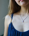 Opal branch waiting necklace on person by Hannah Blount