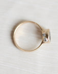 Gold ring on a white background