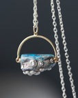 Raw opal necklace with silver barnacles by Hannah Blount