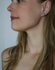 Raw opal studs with silver barnacles by Hannah Blount