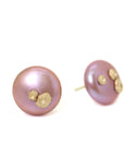 front and side view of large pink button pearl studs with five gold barnacles by hannah blount