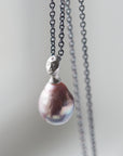 Pink baroque freshwater pearl with silver cameo grey lady face bail and diamond third eye on oxidized black silver chain, by hannah blount jewelry