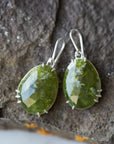 Green vanity earrings by Hannah Blount