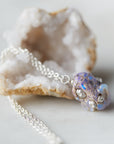 Raw opal silver necklace with barnacles by Hannah Blount