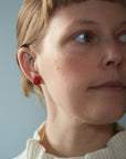 Carved serpentine on carnelian vanity earrings by Hannah Blount