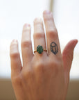 Carved emerald vanity ring by Hannah Blount
