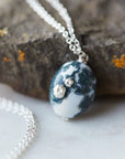 Opal necklace with silver barnacles by Hannah Blount