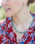 Kingman turquoise necklace with coral-hued silk and silver clasp by Hannah Blount