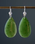 green teardrops under silver scallop ear wires