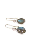 flashing with blue, grey labradorite cones hang beneath silver ear wires and silver roses.