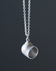 Little moon snail shell silver necklace by Hannah Blount
