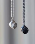 Little moon snail shell silver necklace by Hannah Blount