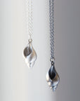 Little tulip shell silver necklace by Hannah Blount