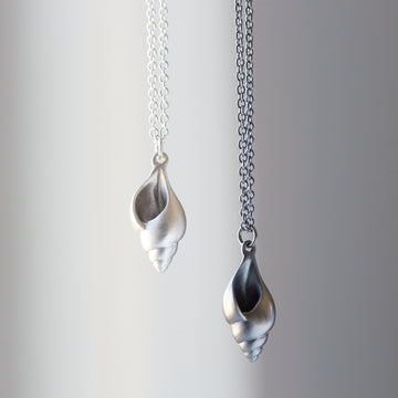Little tulip shell silver necklace by Hannah Blount