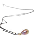 pink freshwater baroque pearl with gold cameo lady face cap and diamond third eye with oxidized black silver chain by hannah blount jewelry