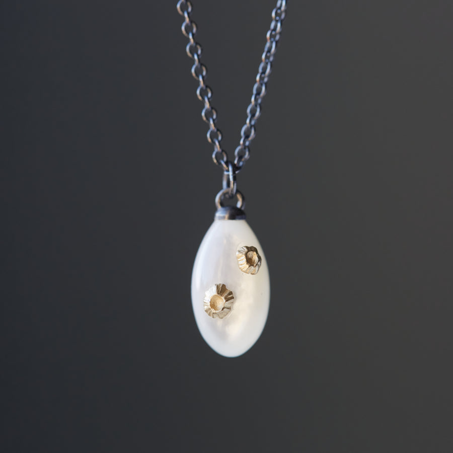 Little mother of pearl necklace with gold barnacles by Hannah Blount