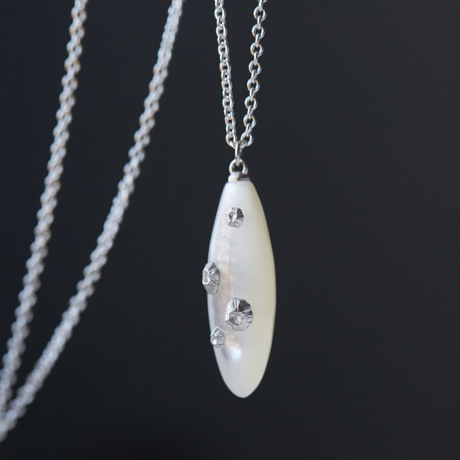 Little mother of pearl necklace with silver barnacles by Hannah Blount