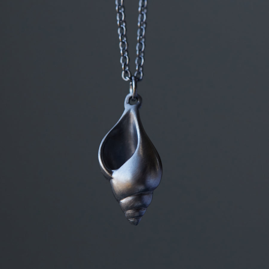 Little tulip shell oxidized silver necklace by Hannah Blount