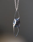 Skate egg necklace with silver chain by Hannah Blount
