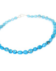 Kingman turquoise necklace with coral-hued silk and silver clasp by Hannah Blount