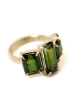 four stone green tourmaline and gold ring
