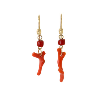Red coral gold figurehead earrings by Hannah Blount